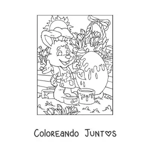 Imagen para colorear del conejo de pascua pintando un huevo