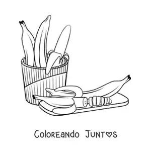 Imagen para colorear de varias bananas junto a una banana cortada en trozos