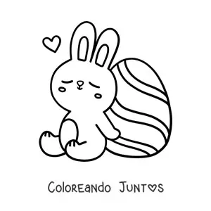 Imagen para colorear de tierno conejo sentado junto a un huevo de Pascua