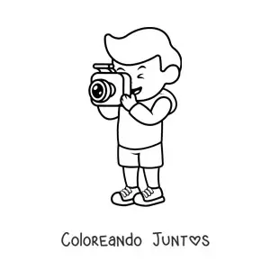 Imagen para colorear de niño fotógrafo animado